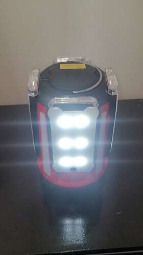 2000030727 COLEMAN Quad Pro Led Panel Lantern Descrption
