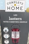 Complete Home Led Lantern 12 Leds Battery Powered Red Black Carry Handle. Fixed Price $6.00.