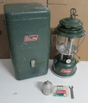 Vintage 1974 Green Coleman Camping Lantern Light Metal Case Accessories. Fixed Price $315.00.