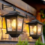 Pasamic 2 Pack Solar Wall Lanterns With Replaceable Pack, Black. Fixed Price $41.94.