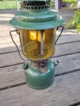 220e Coleman Lantern Green W/ Rising Sun Amber Globe, Shield & Case. Fixed Price $90.00.