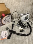 Phueut Pressurized Handheld Multi-surface Steam Cleaner. Fixed Price $25.00.