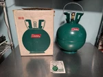 Vintage Coleman Round Propane Tank Model 5410-750, Original Box And Manual. Fixed Price $250.00.