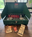 Vintage Coleman 425e Dual Burner Camp Stove - Made In Usa 09/1977. Fixed Price $138.00.