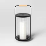 10.5" Black Metal And Glass Battery Led Outdoor Lantern Clear/black - Threshold. Fixed Price $28.89.