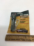 Coleman - Vintage Flashlight Key Chain Green Original Packaging 5345g700k. Fixed Price $12.99.