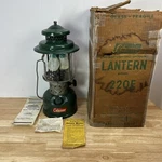Coleman 220e Double Mantle Vintage 1957 With Paper Work And Box Original Globe. Fixed Price $161.95.
