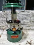 Coleman Double Mantle Lantern With Red Case And Tripod Stand. Untested. Fixed Price $125.00.