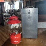 Vintage Coleman Lantern Red 200a With Pyrex Globe Dated 9/64 Wood Box. Fixed Price $200.00.